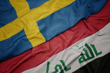 waving colorful flag of iraq and national flag of sweden.