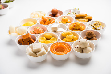Rangoli of Assorted Indian sweets/mithai in bowl for Diwali or any other festivals, selective focus