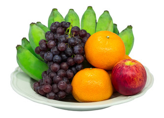 Naklejka na ściany i meble Fruit in a plate on a white background
