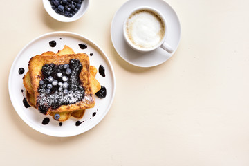 French toasts with blueberry sauce