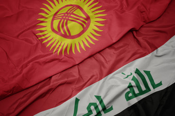 waving colorful flag of iraq and national flag of kyrgyzstan.