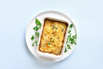 Potato gratin in baking dish