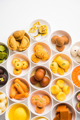 Rangoli of Assorted Indian sweets/mithai in bowl for Diwali or any other festivals, selective focus