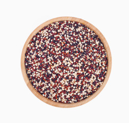 Quinoa in bowl on white background