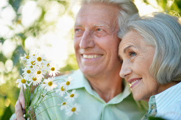 Portrait of beautiful senior couple in the park