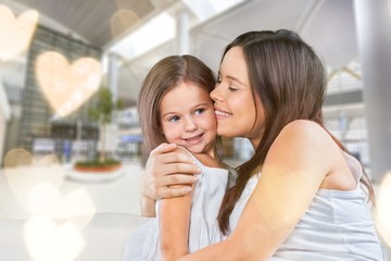 Happy Mother and daughter hugging