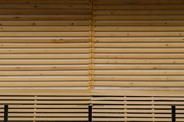 Grid of unpainted wooden slats