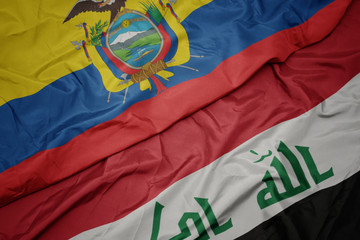 waving colorful flag of iraq and national flag of ecuador.