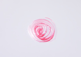 Hand drawn shape. Sample of pink lip gloss on a white background.