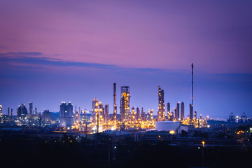 Fototapeta na wymiar Manufacturing of petroleum industrial plant on twilight sky background