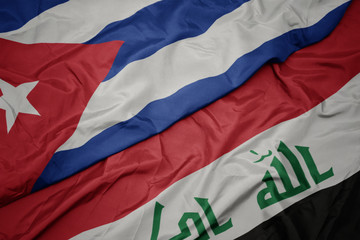 waving colorful flag of iraq and national flag of cuba.