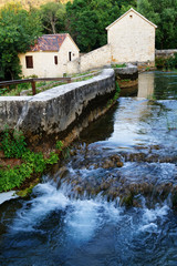 Fototapeta na wymiar Watermill on the Krka River