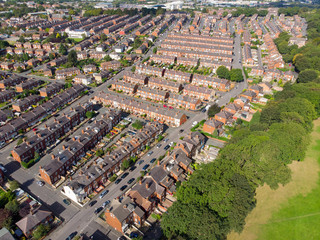 Aerial photo of the town known as Beeston in Leeds West Yorkshire UK, showing a rows of houses in a...