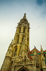 Fototapeta na wymiar Matthias Church spire in the Fisherman's Bastion in Budapest