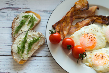 Healthy breakfast. Bacon and eggs. View from above