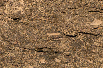 Rock plate. Colored stone surface. Wall of the house. Geology and Metamorphic rocks.