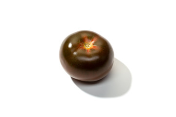 Fresh kumato tomato isolated on white background