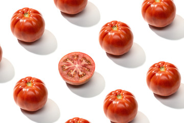 Fresh red tomato pattern isolated on white background
