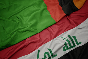 waving colorful flag of iraq and national flag of zambia.