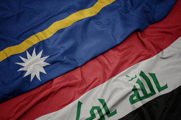 waving colorful flag of iraq and national flag of Nauru .