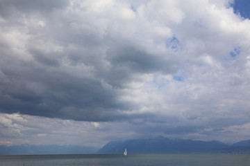 Storm is about to come on the Leman lake with a sailboat
