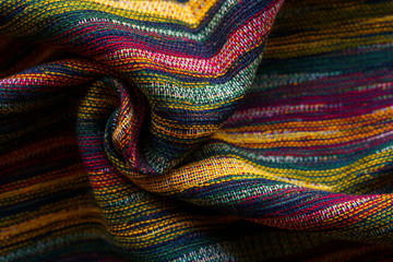 Texture of motley striped fabric closeup. Tapestry background