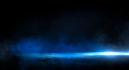Blue dark background of empty foggy street with wet asphalt, illuminated by a searchlight, laser...
