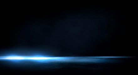Blue dark background of empty foggy street with wet asphalt, illuminated by a searchlight, laser beams, smoke