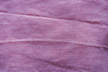 Pink linen cloth texture. Natural fabric material background