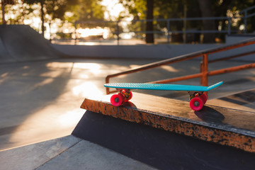 Youth plastic skateboard in a skatepark. Youth Summer Concept © splitov27