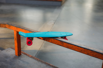 Youth plastic skateboard in a skatepark. Youth Summer Concept © splitov27