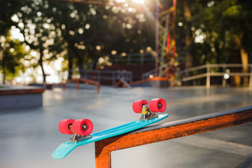 Youth plastic skateboard in a skatepark. Youth Summer Concept © splitov27
