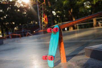 Youth plastic skateboard in a skatepark. Youth Summer Concept © splitov27