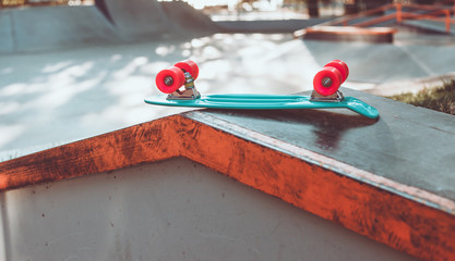 Youth plastic skateboard in a skatepark. Youth Summer Concept
