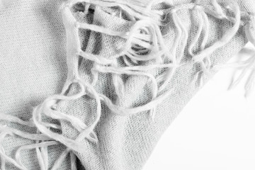 Warm knitted gray plaid. Winter concept. Blanket texture background, Flat lay, top view, copy space