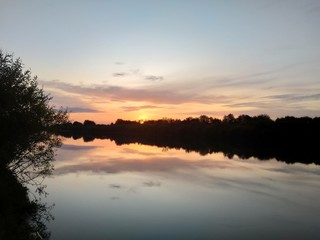 Fototapeta na wymiar sunset river reflection