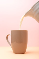 Fresh milk in colored cups