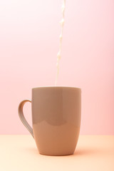 Fresh milk in colored cups