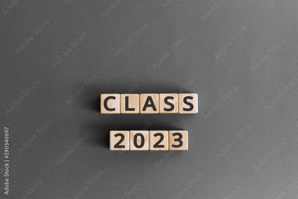 Poster class 2023 - word from wooden blocks with letters, class of 2023 concept, grey background