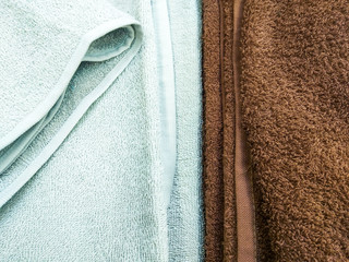 two stacks of tow for a bath of white and brown color