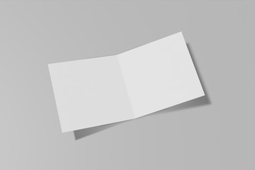 Mockup square booklet, brochure, invitation isolated on a grey background with hard cover and realistic shadow. 3D rendering.