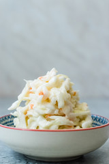 Coleslaw Salad From Cabbage, Carrots and Dressing Mayonnaise in Bowl.