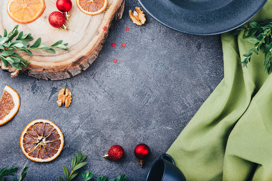Beautiful Christmas composition in the style of flat bark on a tabletop made of natural stone, using eco-materials and healthy food.