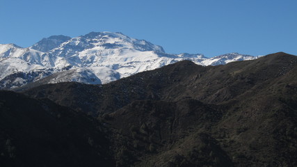 Fototapeta premium view of El Plomo mountain from Pochoco mountain in Santiago, Chili