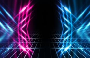 Abstract background. Dark empty stage, multi-colored rays of a neon searchlight, wet asphalt, smoke, night shooting, bokeh color.