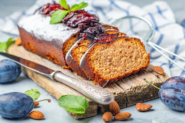 Homemade plum cake with almonds and spicy plum.