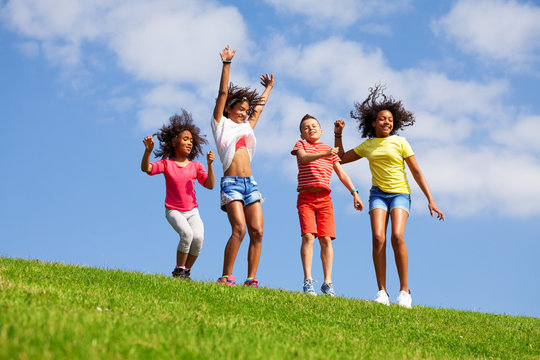 Group Of Happy Dancing And Jumping Kids