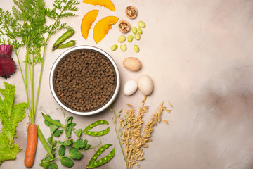 Special vegetarian pet food and natural raw ingredients on light grey background. Flat lay.
