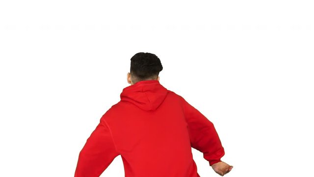 Young man dancing hip-hop doing waves on white background.