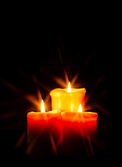 Candles glowing in the dark